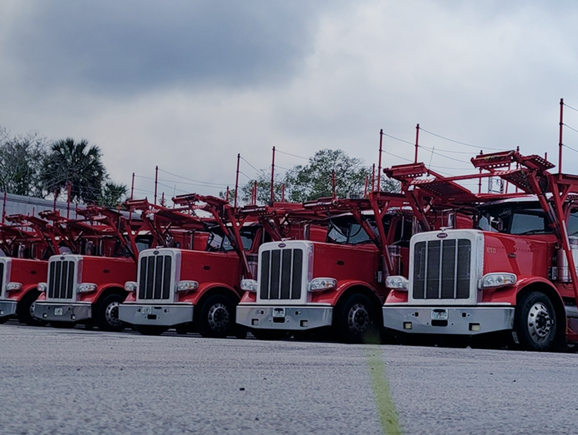 Family loading car on trailer